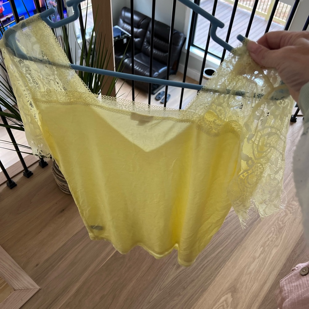Yellow size small Pol shirt, true to size with some stretch. - Picture 4 of 4